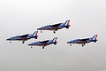 A four-ship element of Alpha Jets from the Patrouille de France arrives on Friday after a Precision Radar Approach talkdown through the murk