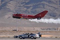 The MiG-17 raced the 'Smoke-N-Thunder' jet car, just visible here behind the 