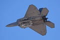 F-22A Raptor fly-by with weapon bays open, notice the AIM-9 Sidewinders