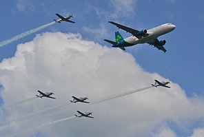 Aer Lingus A320 in formation with 5 Irish Air Corps PC-9Ms