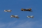 Private aircraft formation lead by a Yak-52