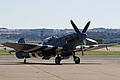 Battle of Britain Memorial Flight Spitfire PR.XIX, PM631, 541 Squadron markings with D-Day Invasion Stripes taxies in at Leuchars.