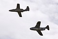 Saab 105/Sk60E and J29F of the Swedish Air Force Historic Flight fly together during the Synchro element of their debut display at Leuchars.