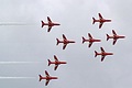 The Red Arrows pass in Typhoon formation with the slot formerly flown by the late Flt.Lt. John Egging left unfilled