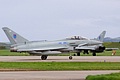 With EL/ZK310 in the lead and EB/ZK304 following two of the four 6 Squadron Typhoon FGR.4 that closed the show taxi back afterwards