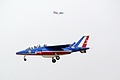 Alpha Jet 3 of the Patrouille de France comes into land after displaying with another team member just visible on the downwind leg beyond 