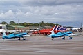 Red Arrows past pass Red Arrows present as the former RAFAT pilots of The Blades team taxy out with their Extra 300s