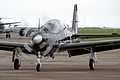 Turning head-on to the camera Tucano T.1 ZF489/489 moves towards its parking slot on the display aircraft ramp