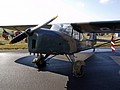 Auster J/1N G-AJAJ has never seen military service and currently wears this completely spurious camouflage scheme