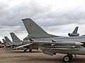 Scandinavian Fighting Falcons lined up for the static display with an AMRAAM Missile on the wingtip station in the foreground
