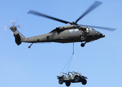UH-60 transporting a HMMV