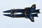 Mirror flight by the Blue Angels solos