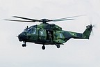 Finnish NH90 loadmaster waving