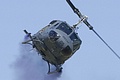 UH-1H display with purple smoke