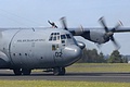C-130H crew member waiving