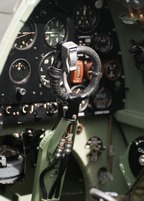 Spitfire Mk.IX instrument panel and typical spade grip-style stick