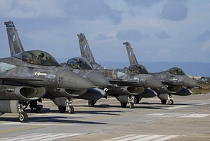 The mission's four HAF F-16C Block 52+s holding on the parallel runway
