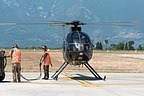 Ground crew removing the power cable as the TH-500 powers up