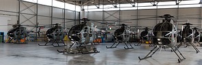 An impressive look into the main hangar with a number of TH-500 residing